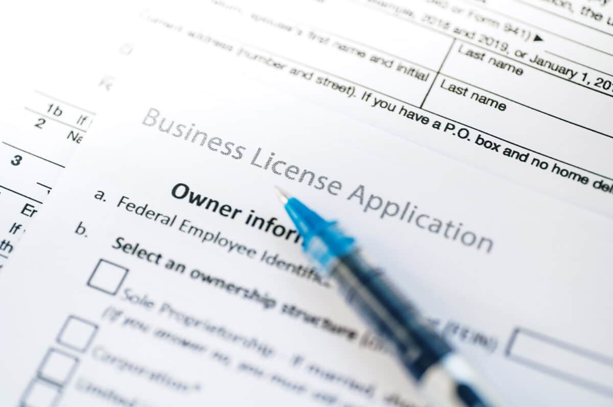 Cannabis business license application documents representing how to get a weed license
